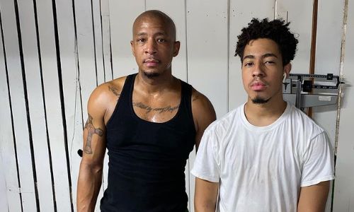  Antwon Tanner with his son after work out, where he is showing his tattoo as wel